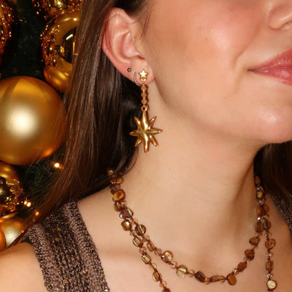 Kralenketting - geknoopt met schelpkralen en sterrenbedel