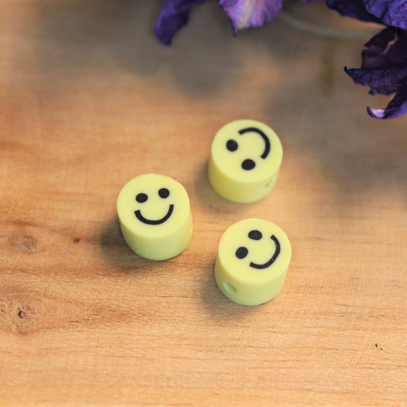 Polymeer smiley geel klein