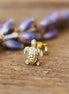 Gold plated stud earring with turtle