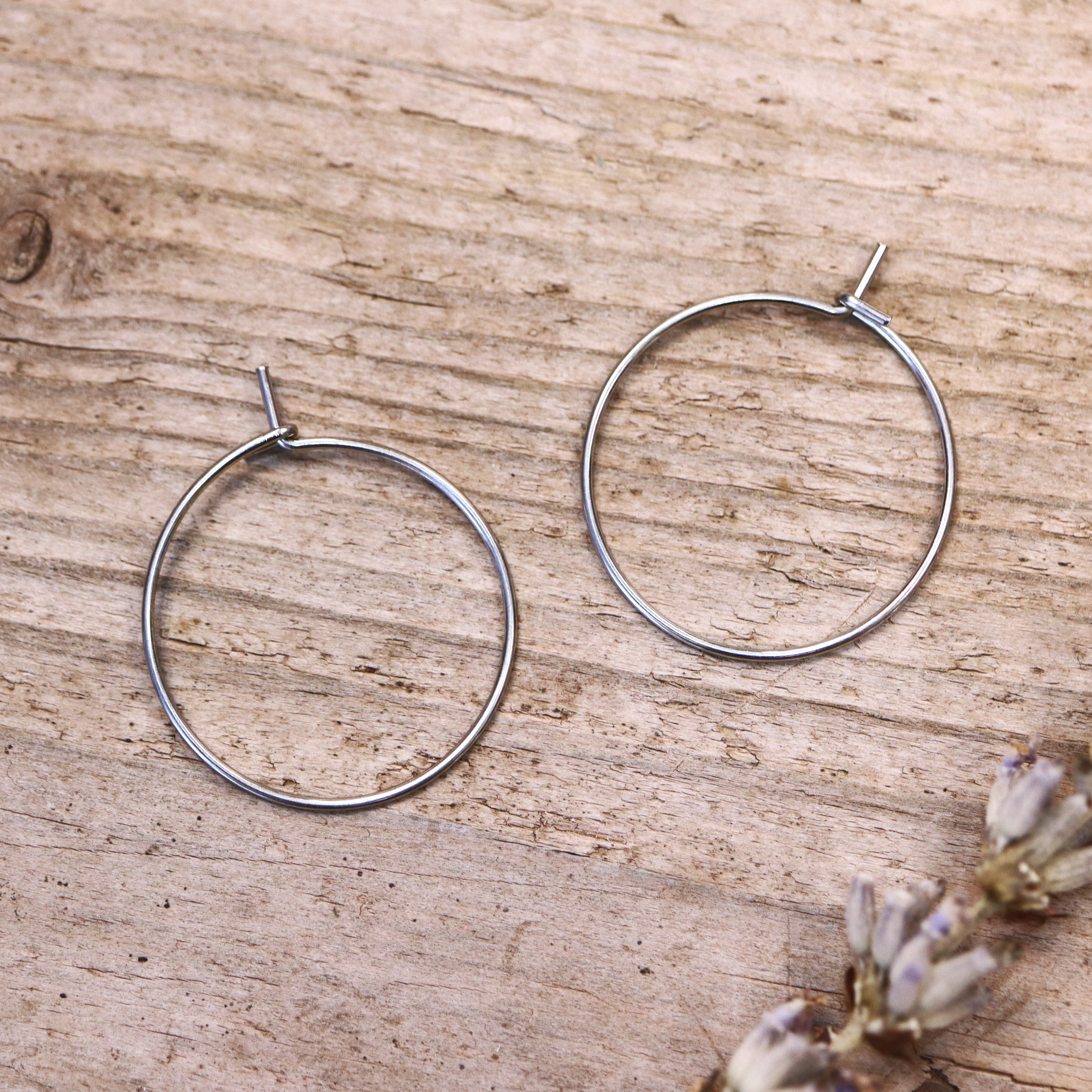 Narrow earring made of stainless steel silver