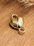 Interposer DQ GOLD heart with sand dollar