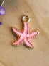 Enamel charm - pink starfish gold