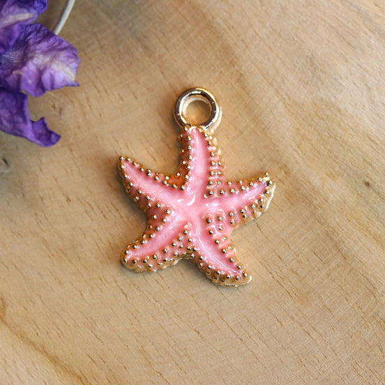 Enamel bedel - roze zeester goud