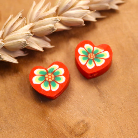 Polymeer rood hart met groene bloem