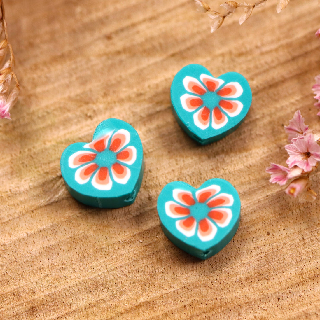 Polymer turquoise heart with red flower