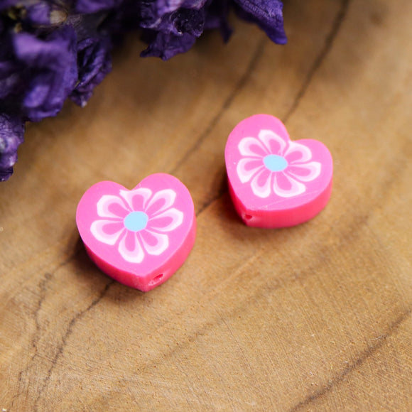 Polymeer roze hart met roze bloem