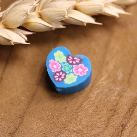 Polymeer blauw hart met bloemen