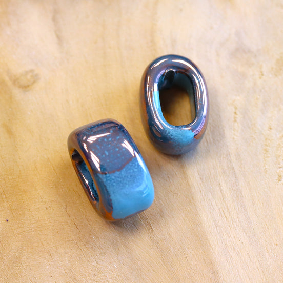 Perle blau - offenes Oval aus Keramik mit Kupferbeschichtung