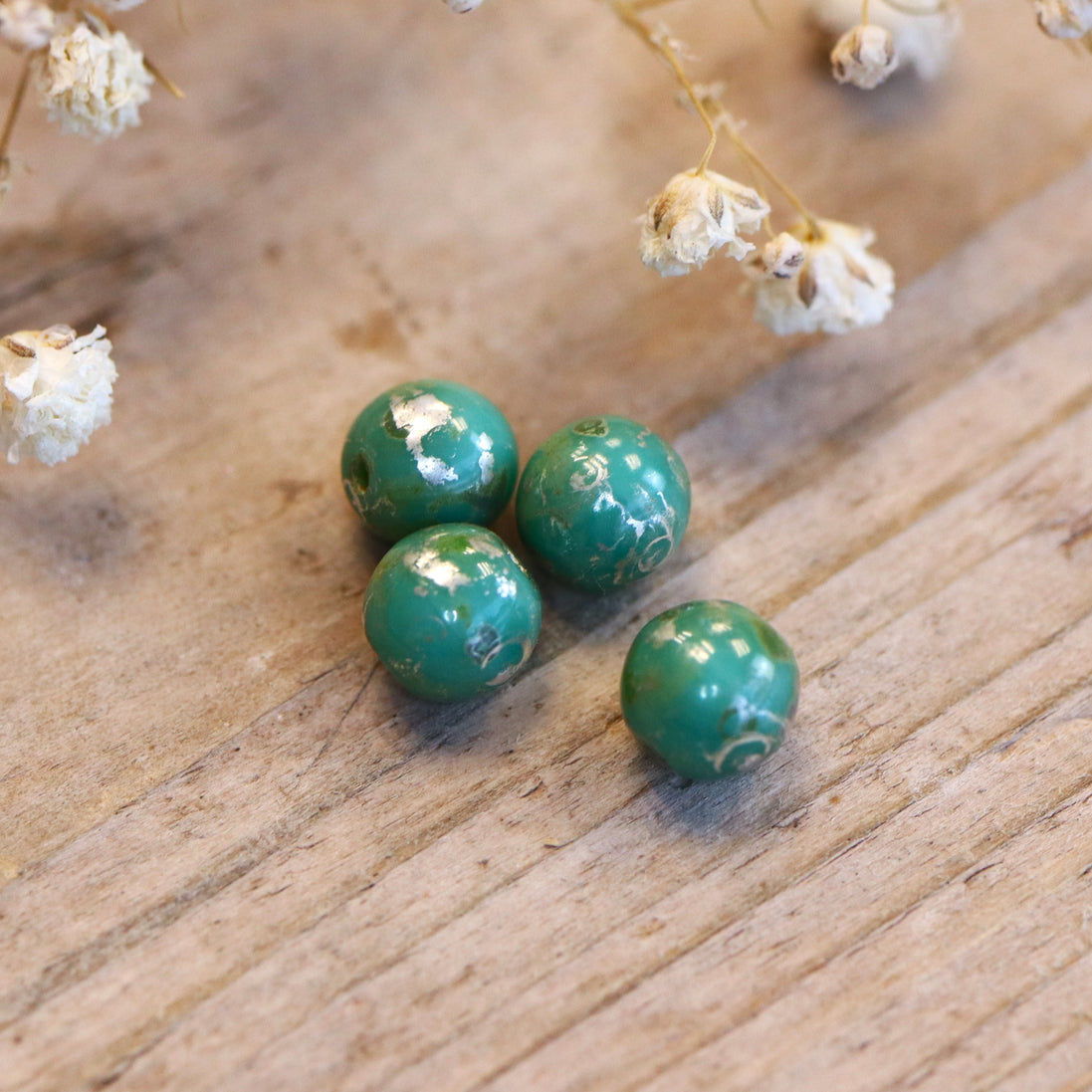 Bead green - round bead with silver plating