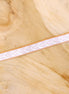 Ribbon arrows beige