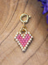 Necklace charm with gold plated clasp - bead heart
