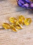 Perle orange - Glasperle oval mit Drehung