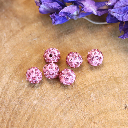 Bead pink - round with small rhinestone