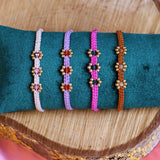 Geknoopte armband met bloemen - lichtroze