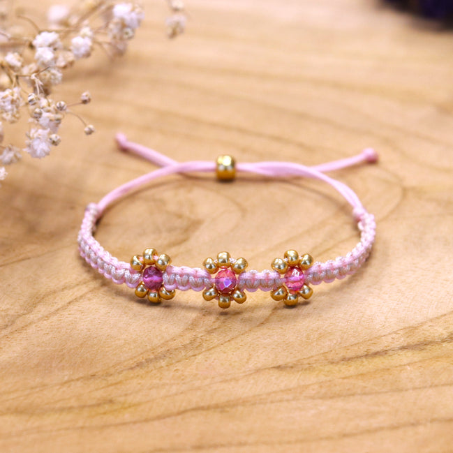 Knotted bracelet with flowers - light pink