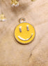 Enamel bedel - smiley geel goud