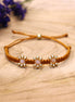 Knotted bracelet with flowers - brown
