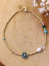 Miyuki bracelet gold with green flower