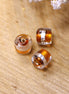 Bead orange - glass bead tube with silver stripe