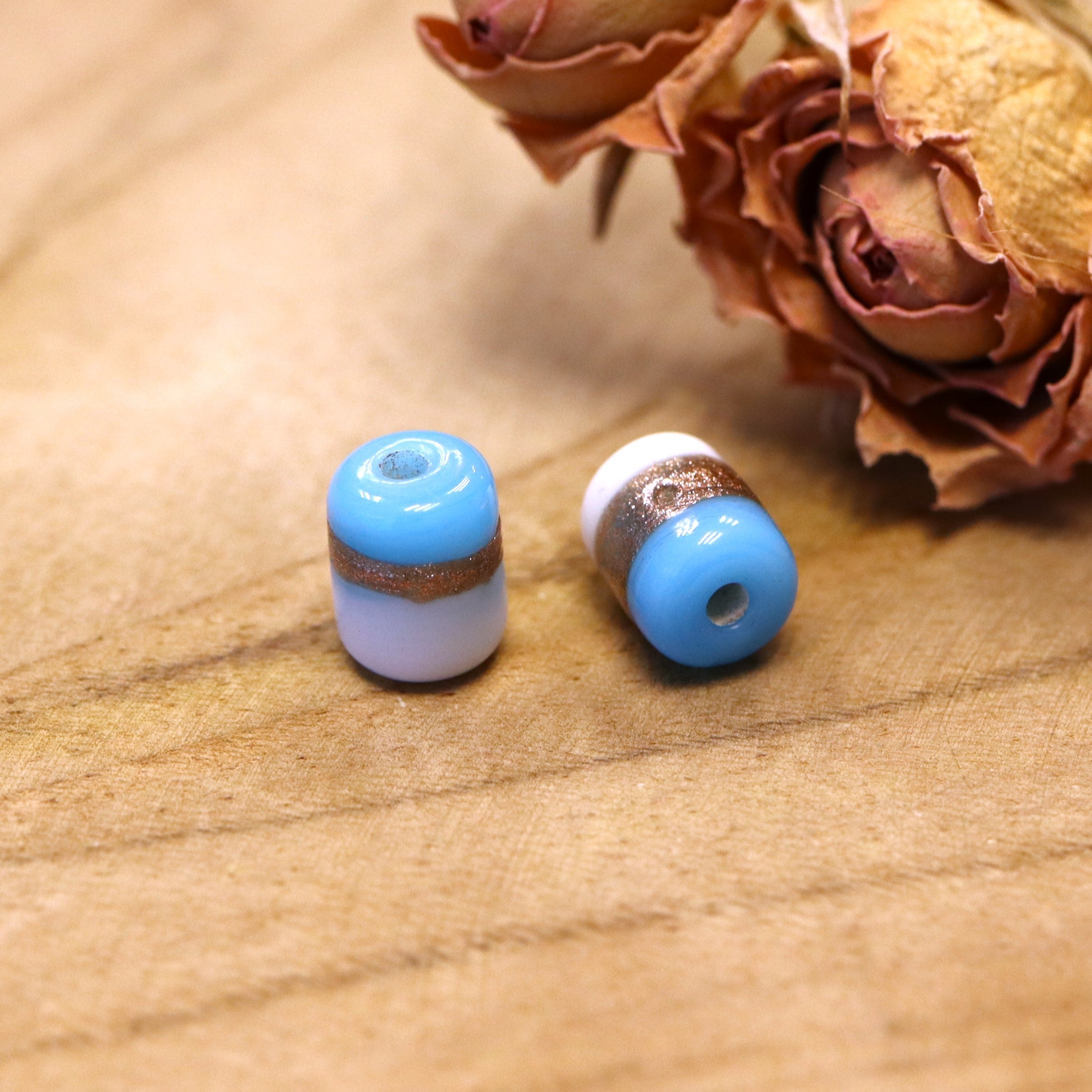 Perle blau - Keramikröhrchen mit rosafarbenem Streifen