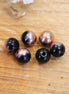 Bead black - round bead with copper plating