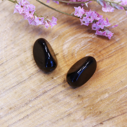 Perle schwarz - Glasperle mit drei Gesichtern