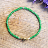 Armband met gouden hartje - groen