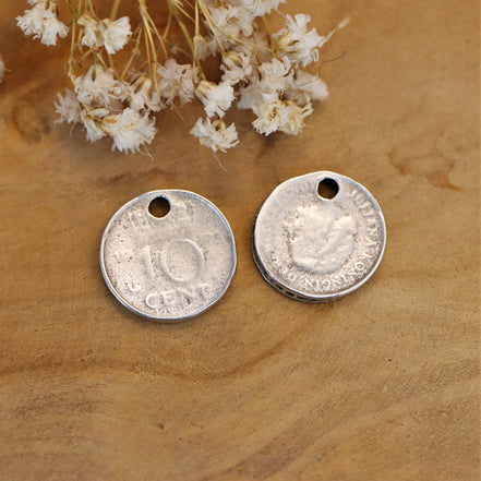 DQ silver charm 10 cents
