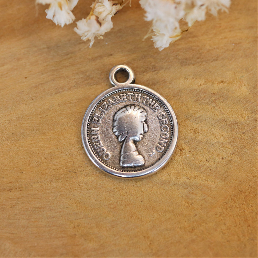 DQ silver coin charm with queen elizabeth