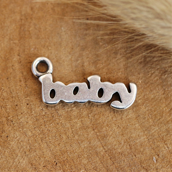 DQ Silber Baby Charm