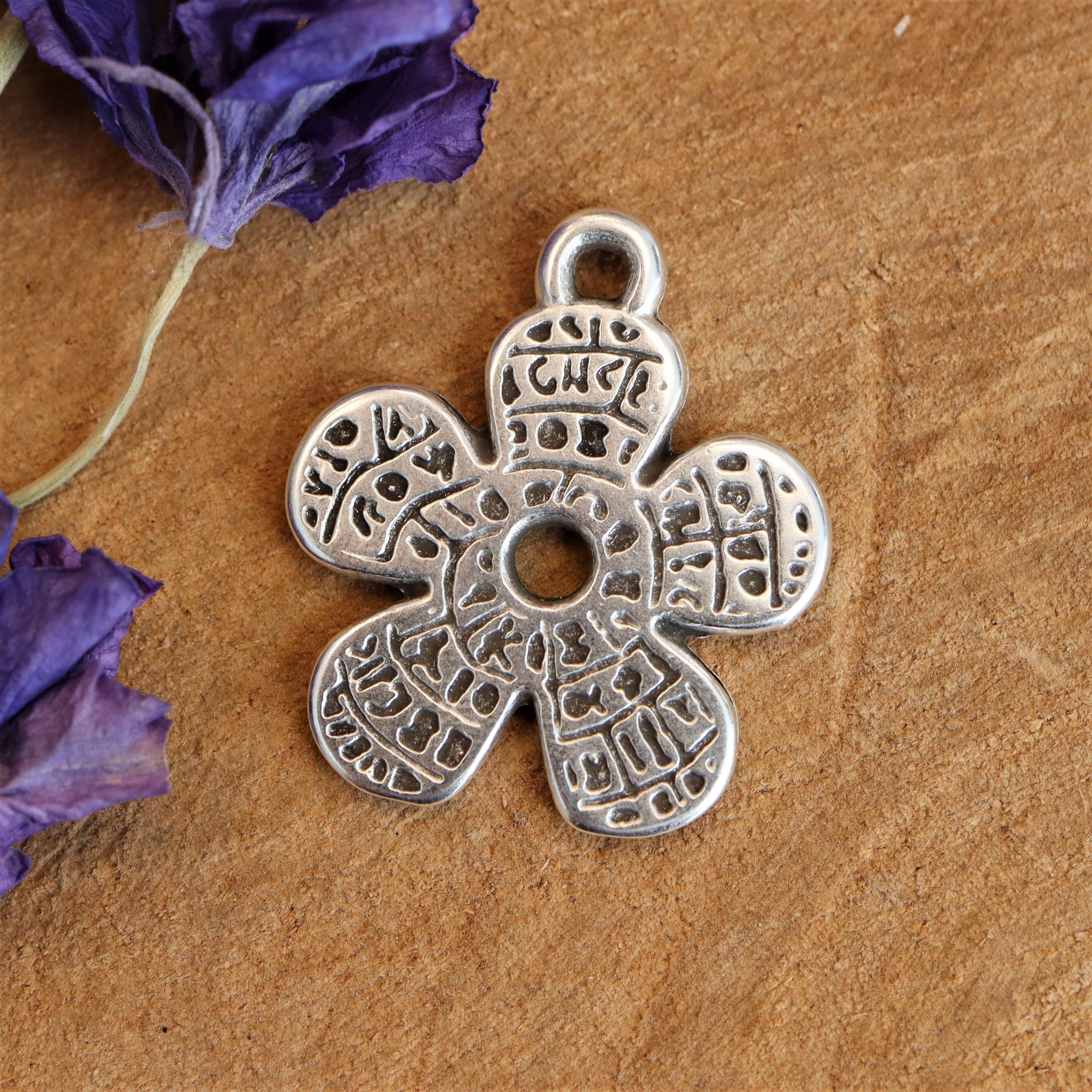 DQ silver charm small carved flower