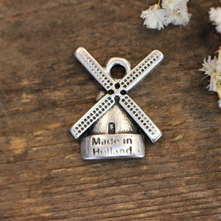 DQ silver windmill charm