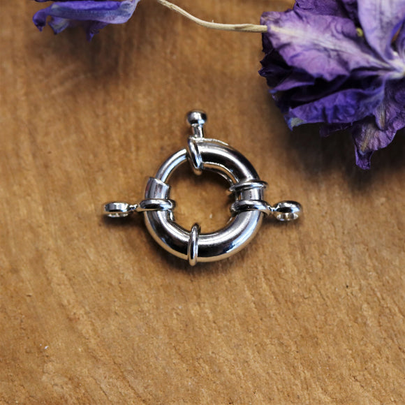 Verguld boeislot zilver