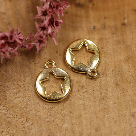 Charm DQ GOLD punched out star small