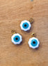 Enamel bedel - evil eye wit goud