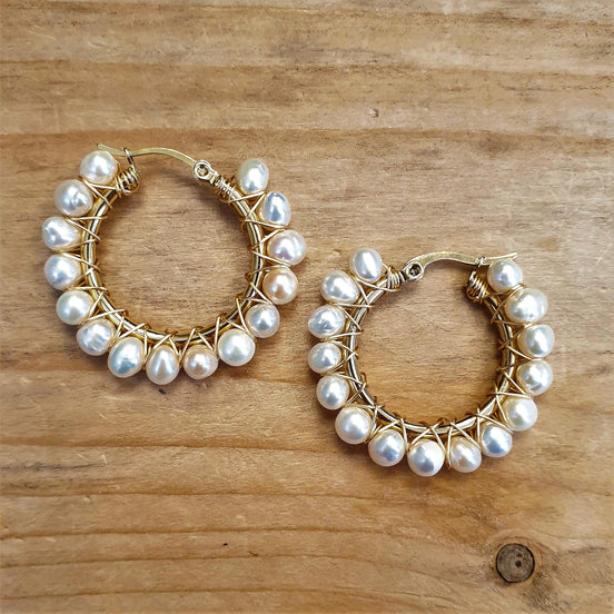 Stainless steel oorringen met zoetwaterparels goud