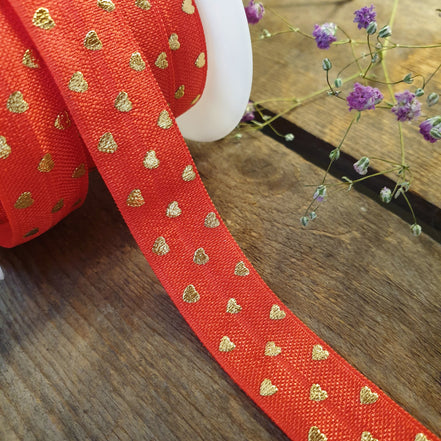 Elastic Ibiza ribbon red with gold hearts 1 meter