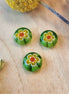 Perle grün - Millefiori mit gelber Blume