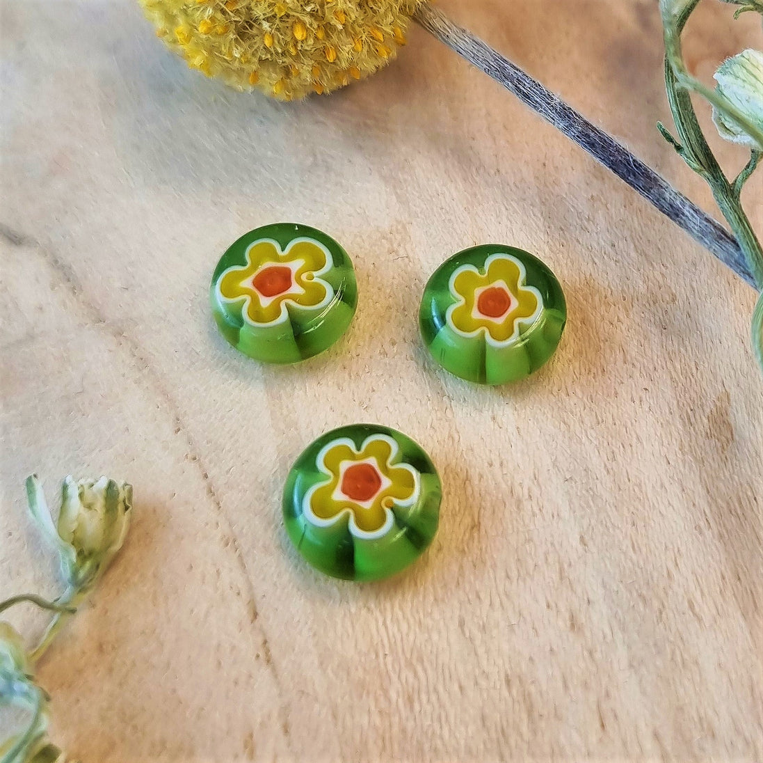 Perle grün - Millefiori mit gelber Blume